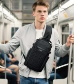 OZUKO 9879 Crossbody Sling Backpack with Tripod Holder and Water-Resistant Design for Travel and Daily Commute - Image 14